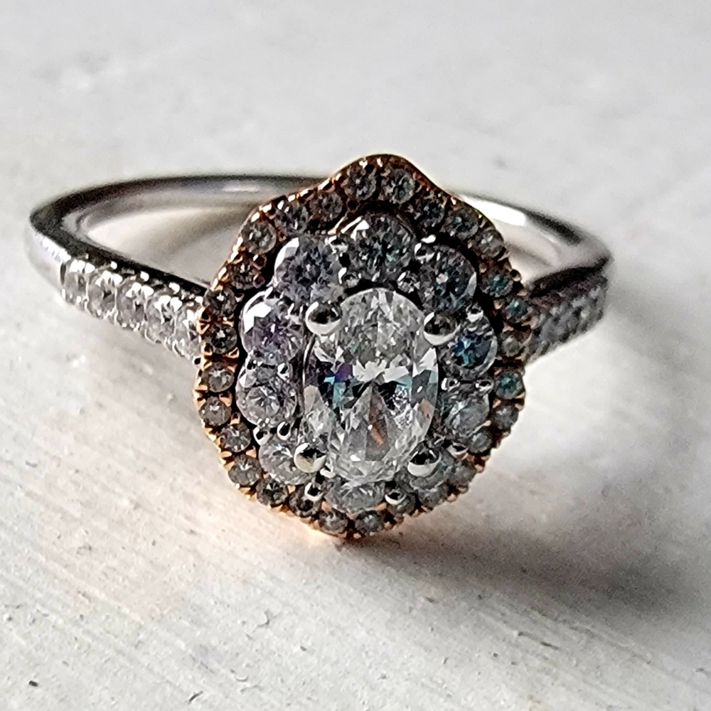 Certified oval diamond engagement ring